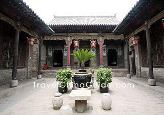 The layout of a courtyard is symmetrical.